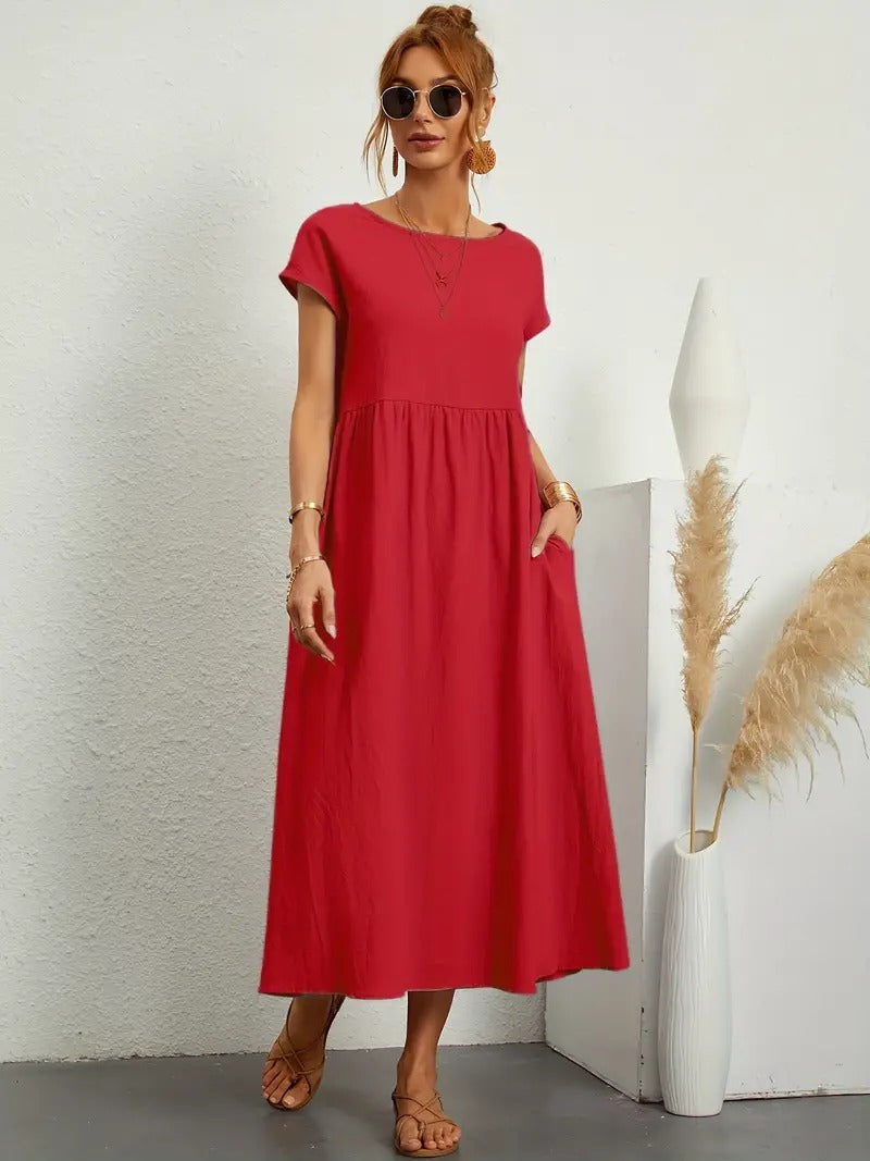 "Abito donna elegante in lino con tasche, colorato e versatile, per un look sofisticato e comodo in ogni stagione."