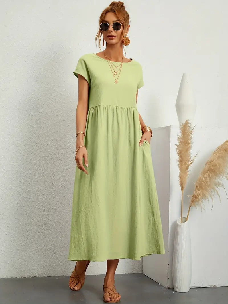 "Abito donna elegante in lino con tasche, colorato e versatile, per un look sofisticato e comodo in ogni stagione."