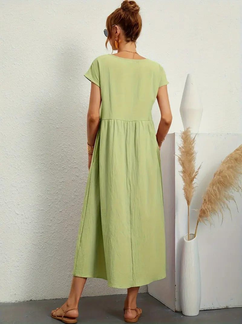 "Abito donna elegante in lino con tasche, colorato e versatile, per un look sofisticato e comodo in ogni stagione."