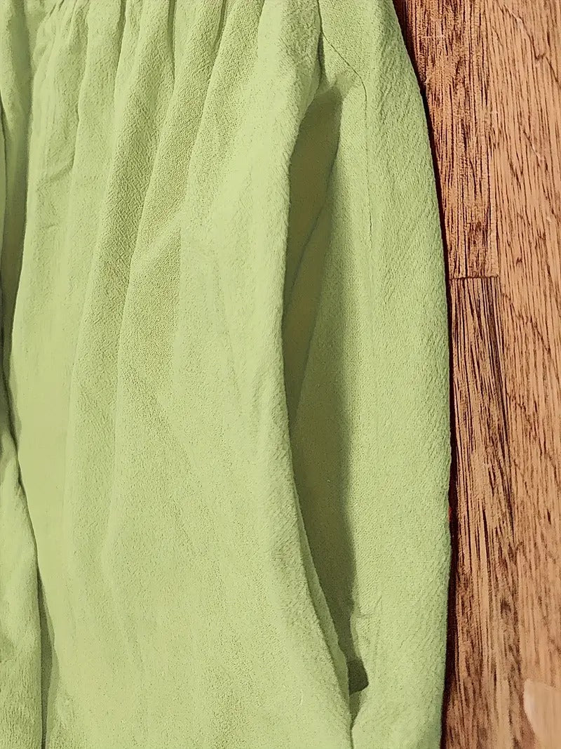 "Abito donna elegante in lino con tasche, colorato e versatile, per un look sofisticato e comodo in ogni stagione."
