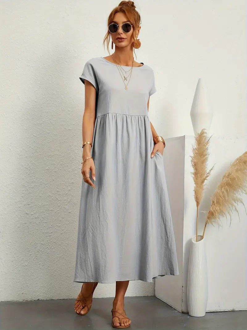 "Abito donna elegante in lino con tasche, colorato e versatile, per un look sofisticato e comodo in ogni stagione."