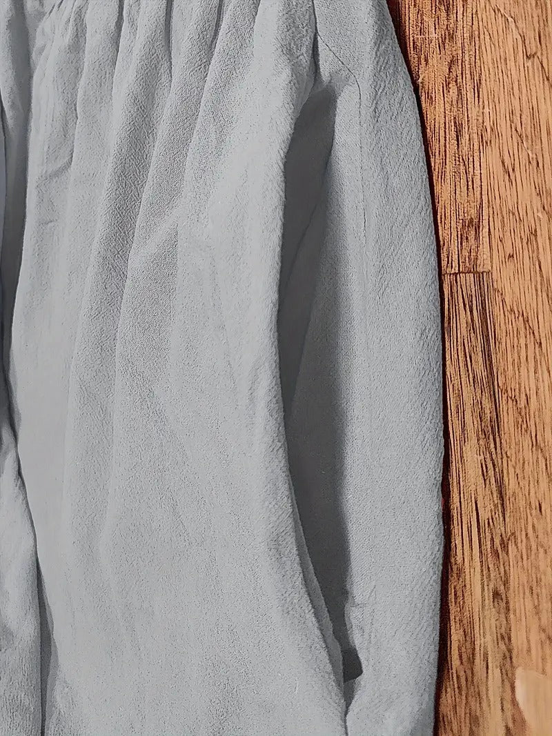 "Abito donna elegante in lino con tasche, colorato e versatile, per un look sofisticato e comodo in ogni stagione."