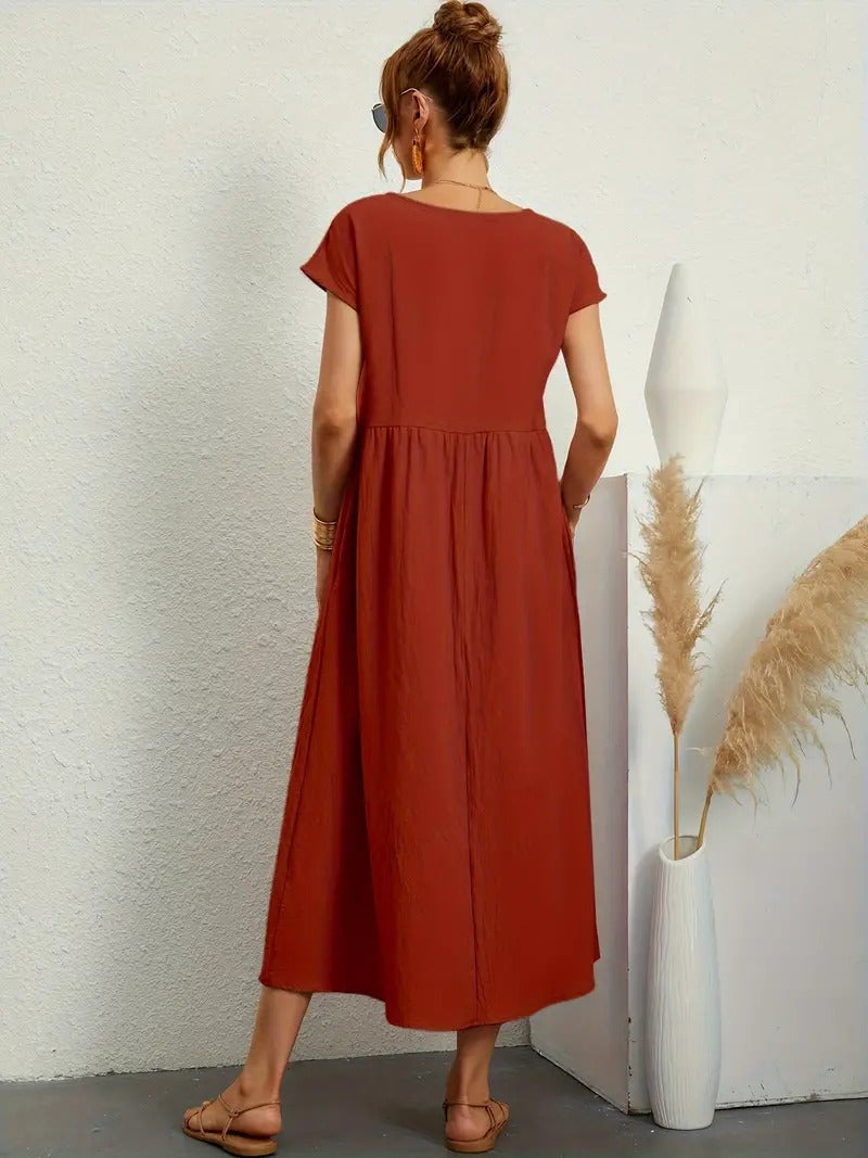 "Abito donna elegante in lino con tasche, colorato e versatile, per un look sofisticato e comodo in ogni stagione."