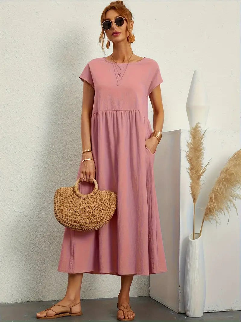 "Abito donna elegante in lino con tasche, colorato e versatile, per un look sofisticato e comodo in ogni stagione."