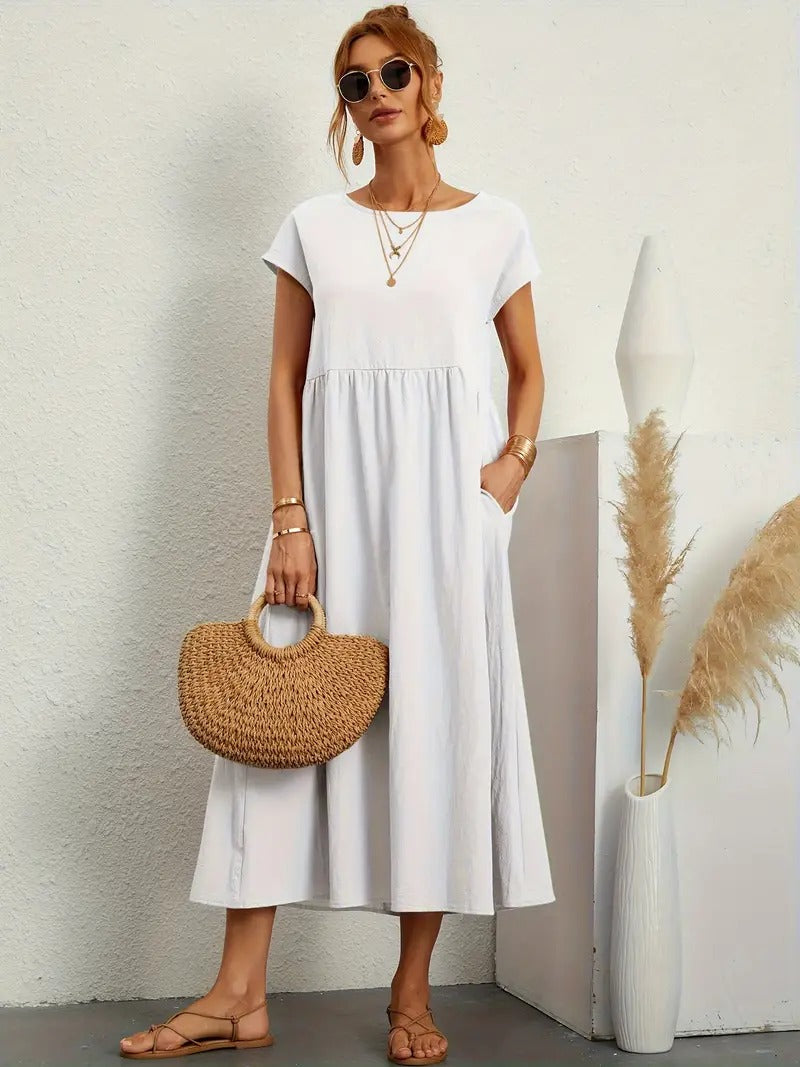 "Abito donna elegante in lino con tasche, colorato e versatile, per un look sofisticato e comodo in ogni stagione."