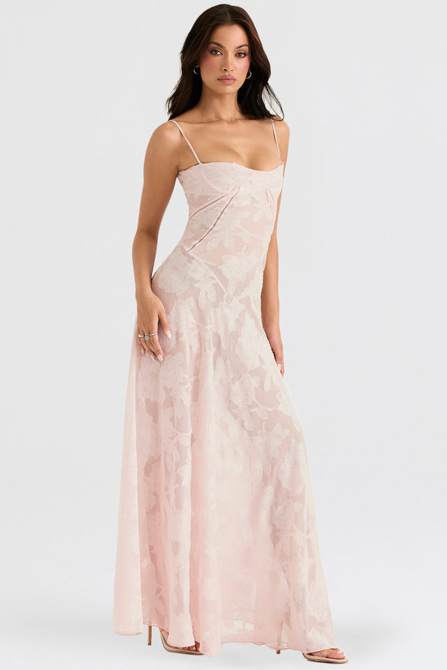 "Abito donna in pizzo lamé rosa semi-trasparente con motivi floreali e spalline rouleau, elegante per eventi glamour."