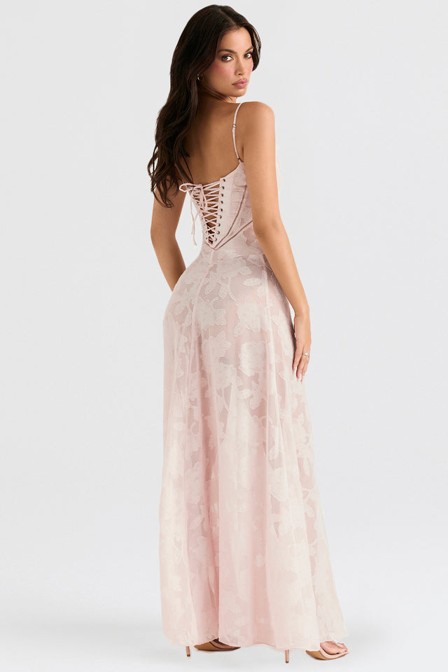 "Abito donna in pizzo lamé rosa semi-trasparente con motivi floreali e spalline rouleau, elegante per eventi glamour."