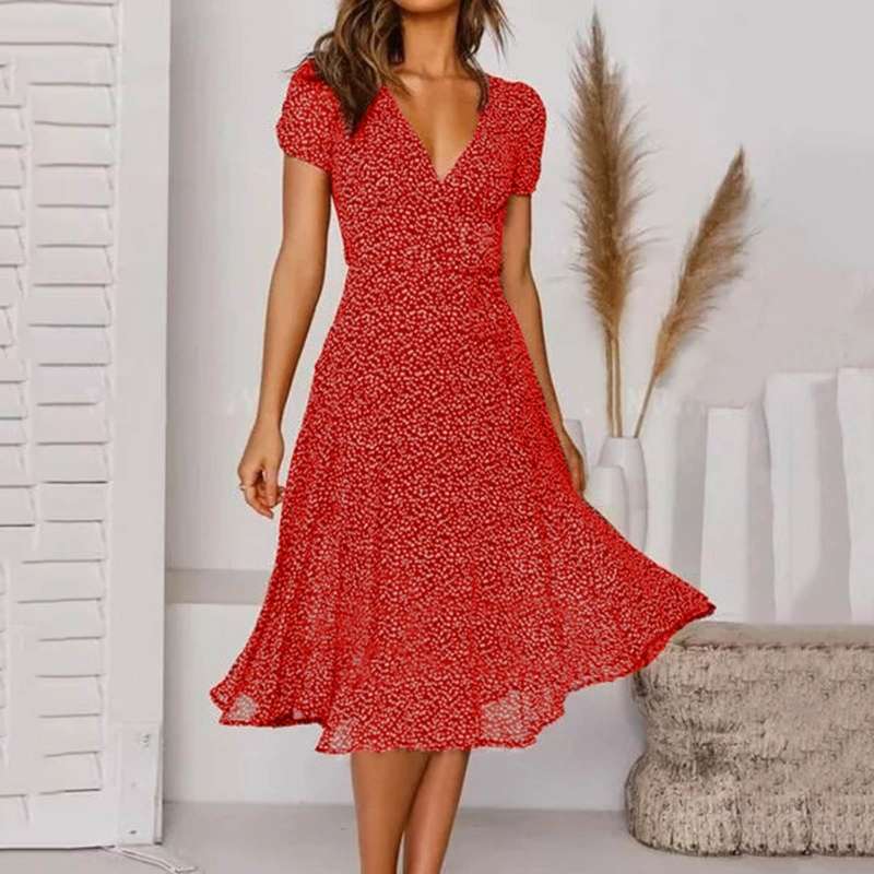 "Abito estivo donna A-line, scollo a V, senza maniche, colori vivaci, design fluido per un look fresco ed elegante."