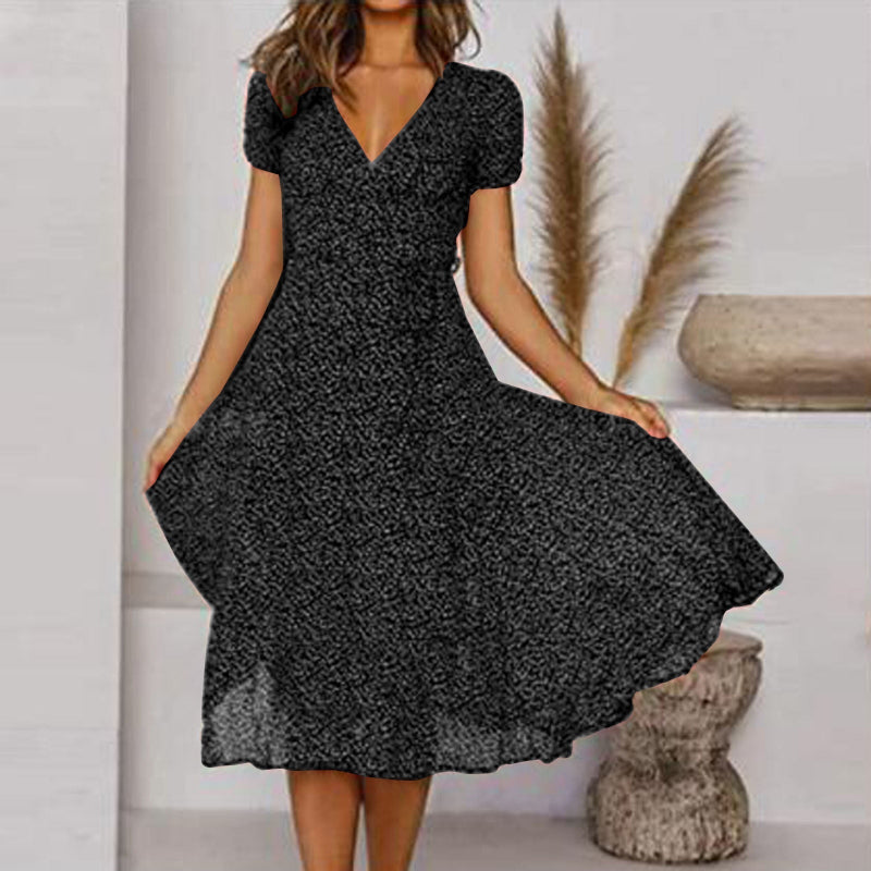 "Abito estivo donna A-line, scollo a V, senza maniche, colori vivaci, design fluido per un look fresco ed elegante."