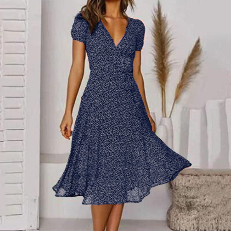 "Abito estivo donna A-line, scollo a V, senza maniche, colori vivaci, design fluido per un look fresco ed elegante."