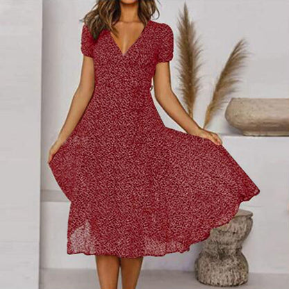 "Abito estivo donna A-line, scollo a V, senza maniche, colori vivaci, design fluido per un look fresco ed elegante."