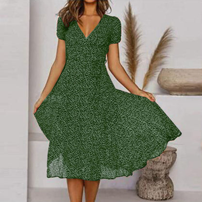 "Abito estivo donna A-line, scollo a V, senza maniche, colori vivaci, design fluido per un look fresco ed elegante."