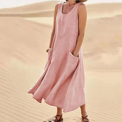"Abito estivo in lino donna, design rilassato con tasche voluminose, perfetto per un look chic e confortevole."