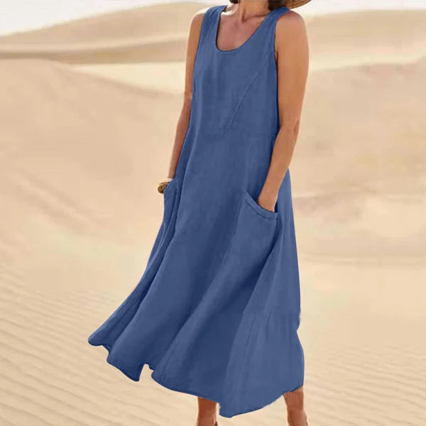 "Abito estivo in lino donna, design rilassato con tasche voluminose, perfetto per un look chic e confortevole."