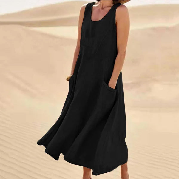 "Abito estivo in lino donna, design rilassato con tasche voluminose, perfetto per un look chic e confortevole."