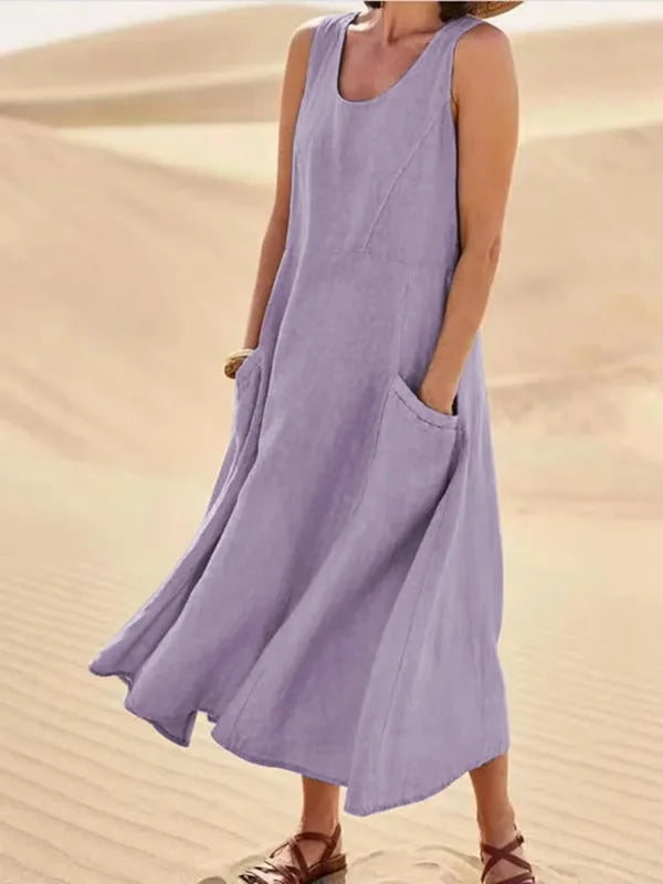 "Abito estivo in lino donna, design rilassato con tasche voluminose, perfetto per un look chic e confortevole."