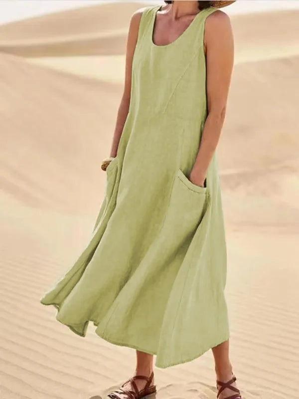"Abito estivo in lino donna, design rilassato con tasche voluminose, perfetto per un look chic e confortevole."
