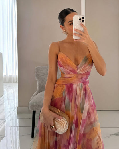 "Abito lungo donna floreale elegante, stampa delicata, silhouette fluida, ideale per eventi speciali. Vista frontale."