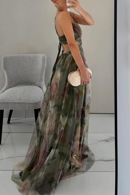 "Abito lungo donna floreale elegante, stampa delicata, silhouette fluida, ideale per eventi speciali. Vista frontale."