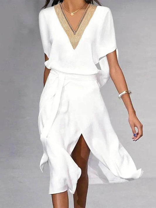 "Abito midi bianco donna, scollo a V, elegante e leggero, perfetto per l'estate, esalta la silhouette con classe."