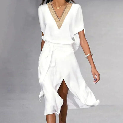 "Abito midi bianco donna, scollo a V, elegante e leggero, perfetto per l'estate, esalta la silhouette con classe."