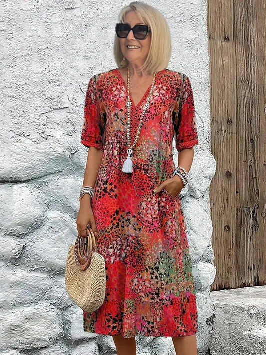"Abito midi da donna con scollo a V, tessuto leggero e colori multipli. Elegante e versatile per ogni occasione."