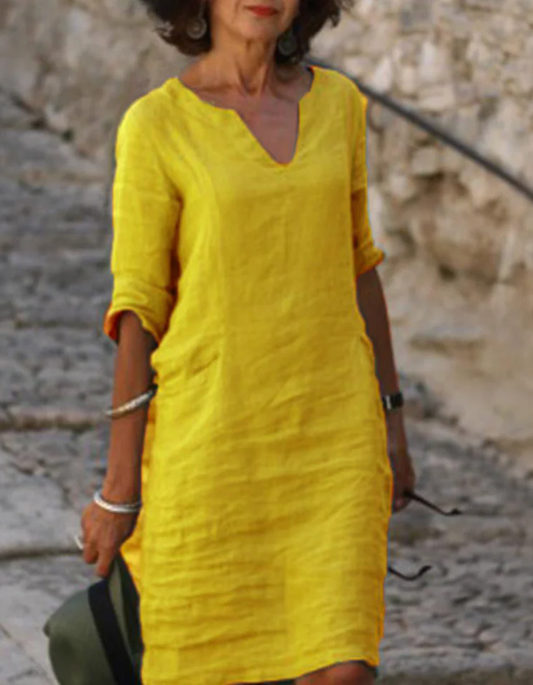 "Abito tunica donna lino con scollo a V, silhouette fluente, ideale per l'estate, colore chiaro, stile casual e raffinato"