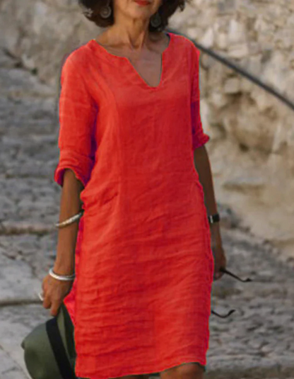 "Abito tunica donna lino con scollo a V, silhouette fluente, ideale per l'estate, colore chiaro, stile casual e raffinato"