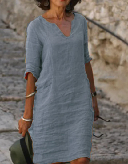"Abito tunica donna lino con scollo a V, silhouette fluente, ideale per l'estate, colore chiaro, stile casual e raffinato"