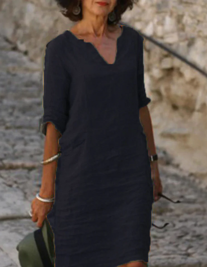 "Abito tunica donna lino con scollo a V, silhouette fluente, ideale per l'estate, colore chiaro, stile casual e raffinato"