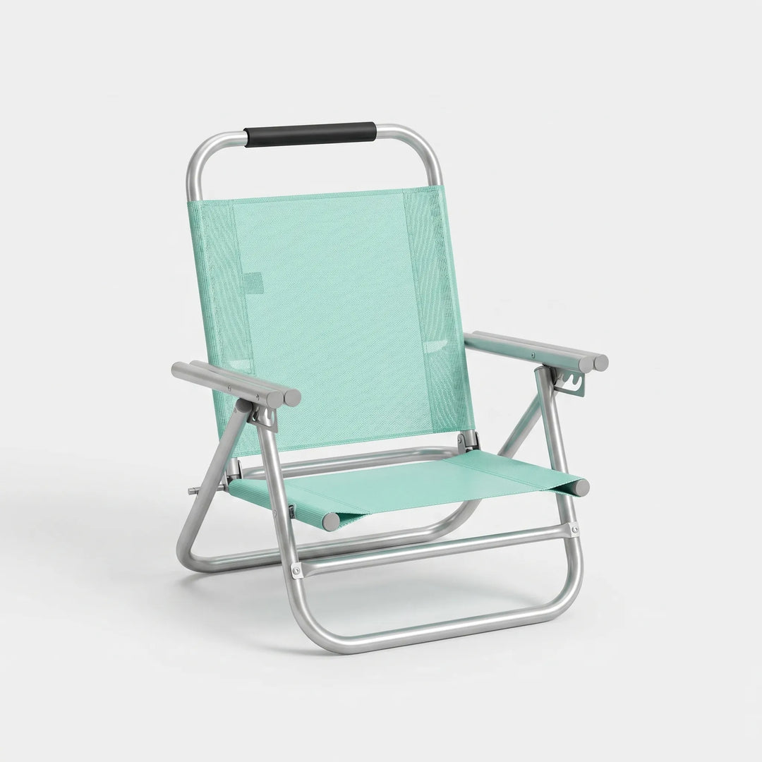 Lightweight folding beach chair with adjustable backrest. Ideal for patio, camping, or any outdoor seating.
