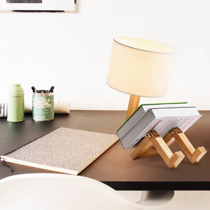 Decorative wooden robot lamp, adjustable for desk or bedside, enhancing modern home decor.
