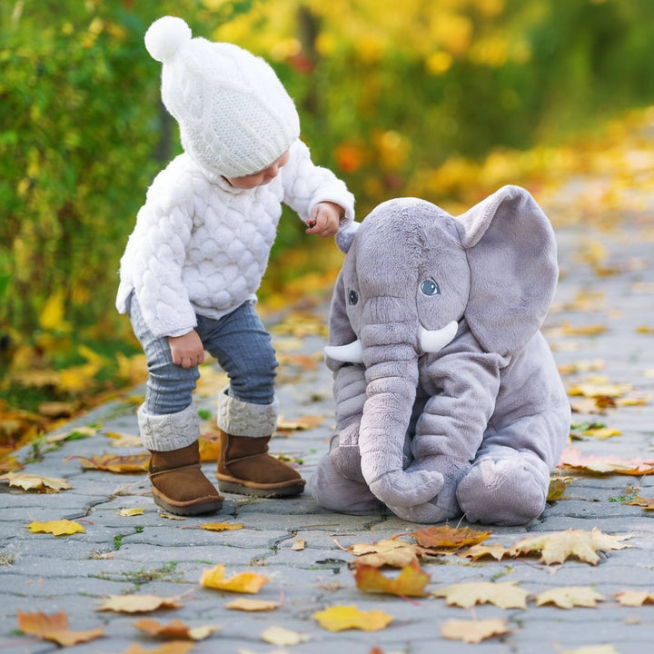 Comfy grey elephant plush pillow, a snuggly cuddle buddy & nursery decor for baby's room.