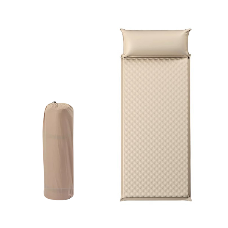 Rolled-up self-inflating camping mattress with carry bag, ideal for hiking and travel