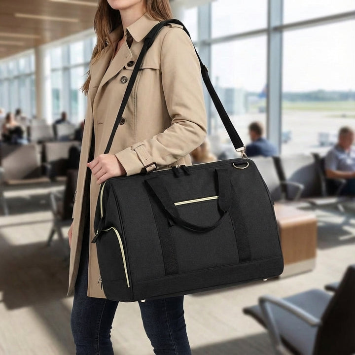 Black 33L waterproof travel duffel bag, perfect for gym, weekend trips, or carry-on luggage. Durable oxford fabric.