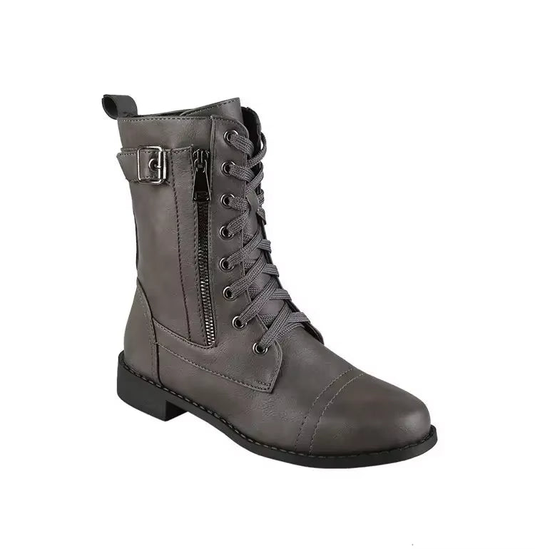 Comfortable women's mid-calf buckle boots in brown, designed for an edgy and fashionable rebel style.