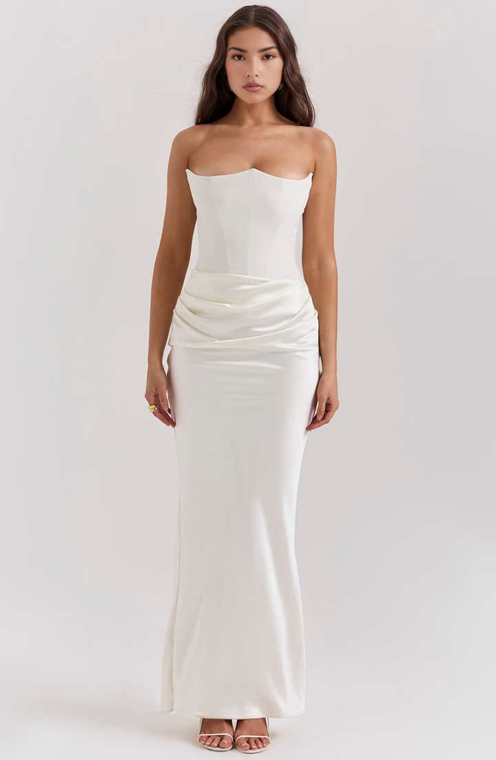 Long black wedding guest dress, a formal strapless maxi design.