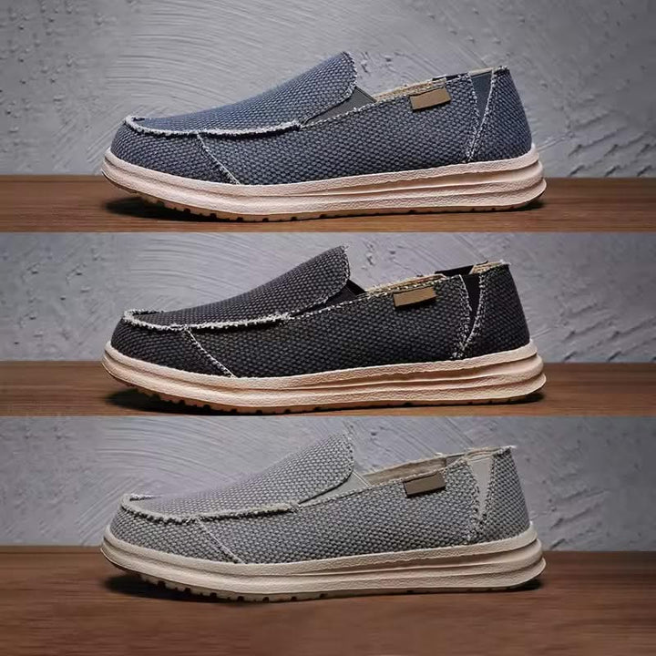 Black men's lightweight comfort slip-on loafers. Ideal for casual everyday walking & versatile style.
