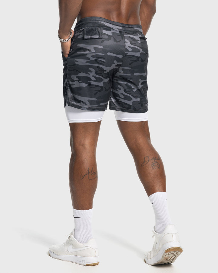 White lightweight workout shorts for men, mesh fabric and a soft liner.