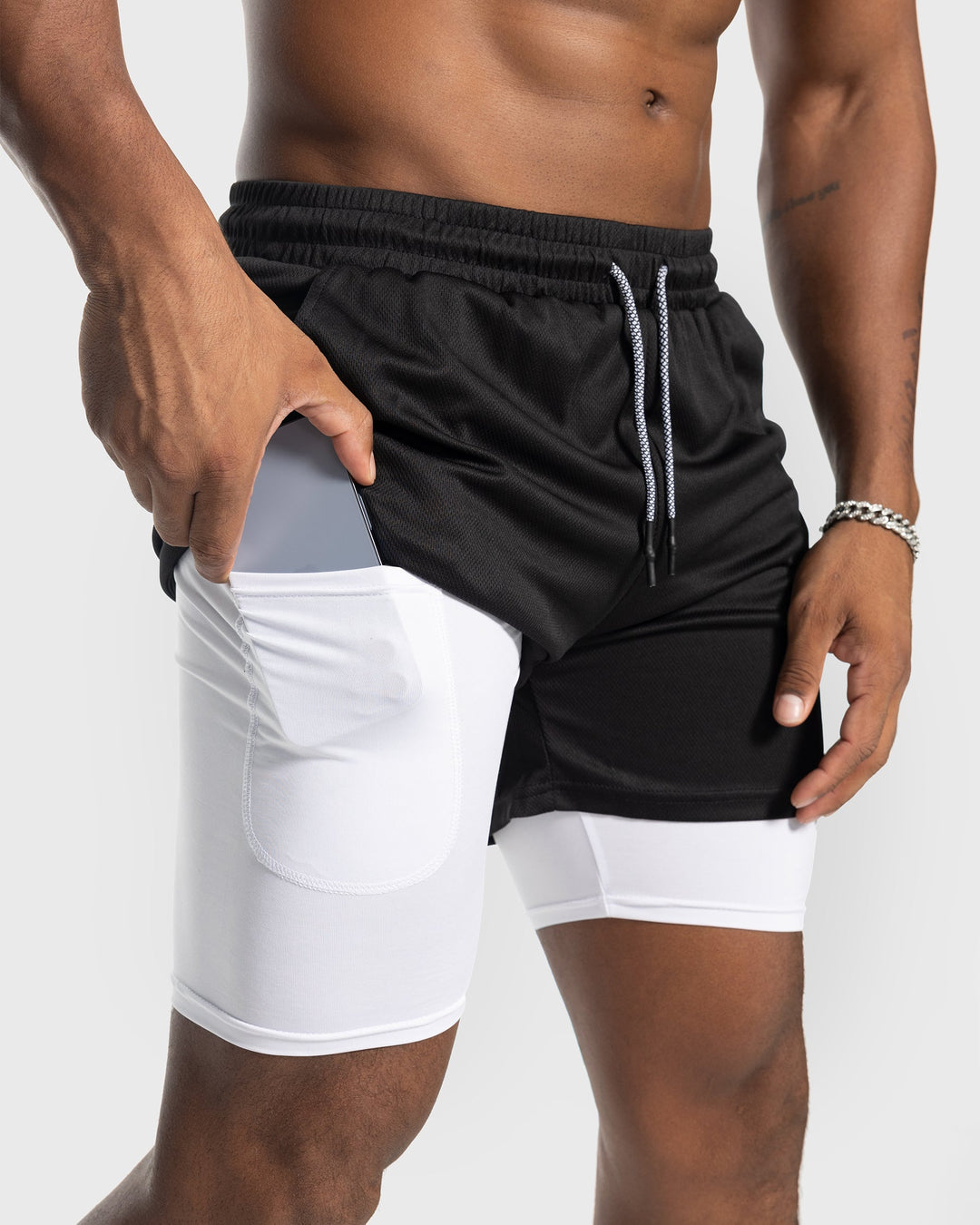 White men's lined athletic shorts, lightweight mesh for running & exercise.