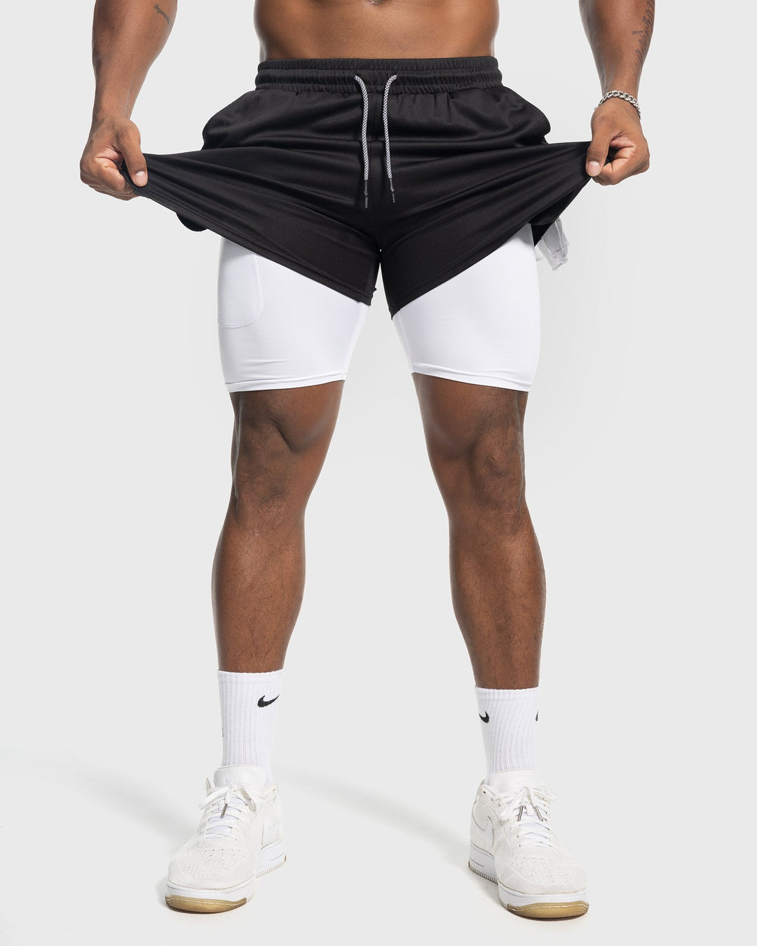 Olive men's workout shorts, performance mesh, with a comfortable inner liner.