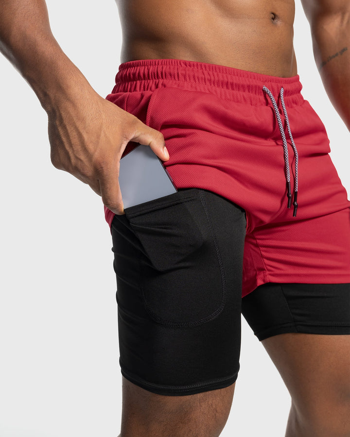 Charcoal men's gym shorts with built-in liner, quick-dry performance activewear.