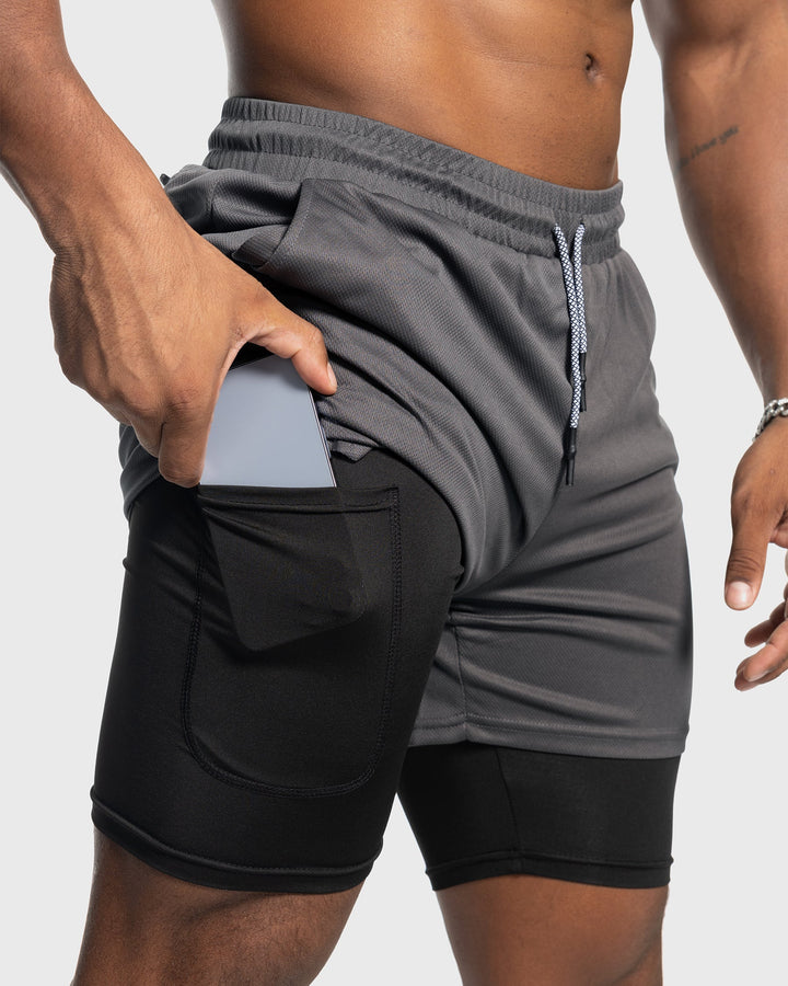 Royal Blue performance workout shorts, mesh design & supportive liner for men.