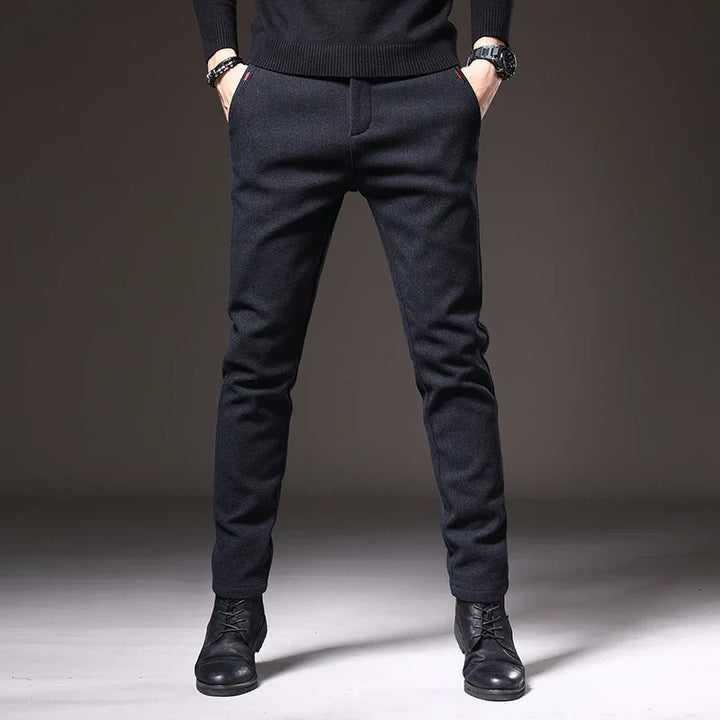 Blue men's tailored casual pants, slim fit with stretch, versatile and modern.