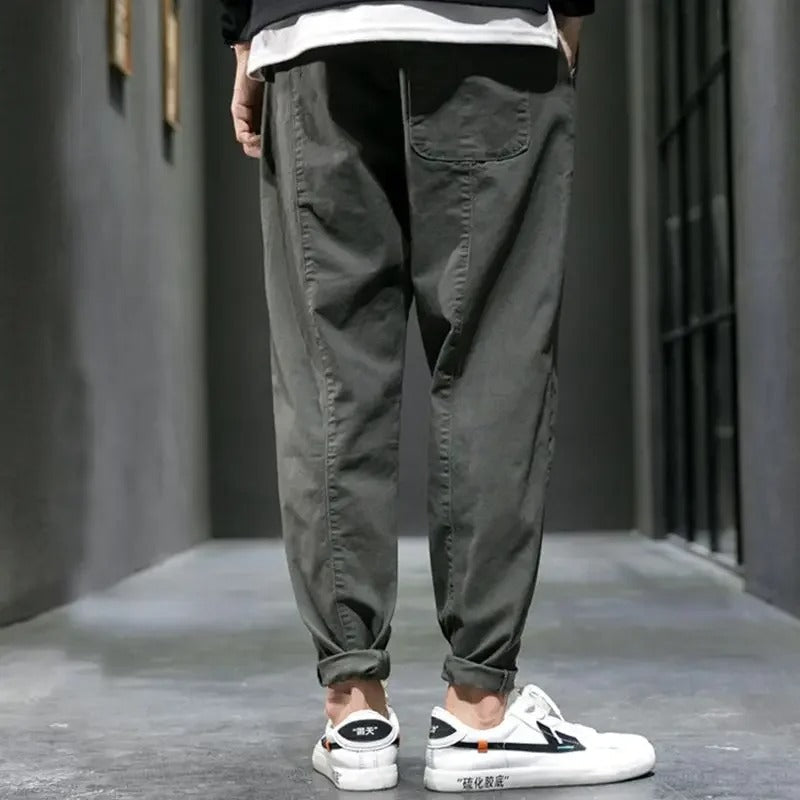Men's tapered joggers featuring an adjustable drawstring waist for a perfect fit & effortless style.