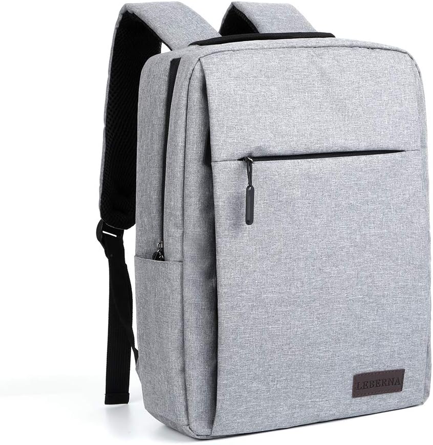 Black slim waterproof laptop backpack with USB charging port. Perfect for daily commute & travel.