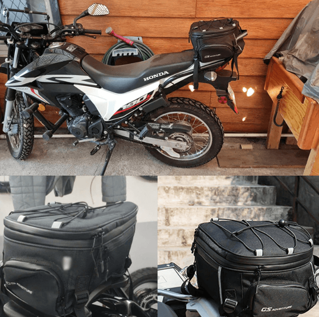 Spacious black water-resistant motorcycle gear bag. Multiple compartments & durable design for secure rider luggage.