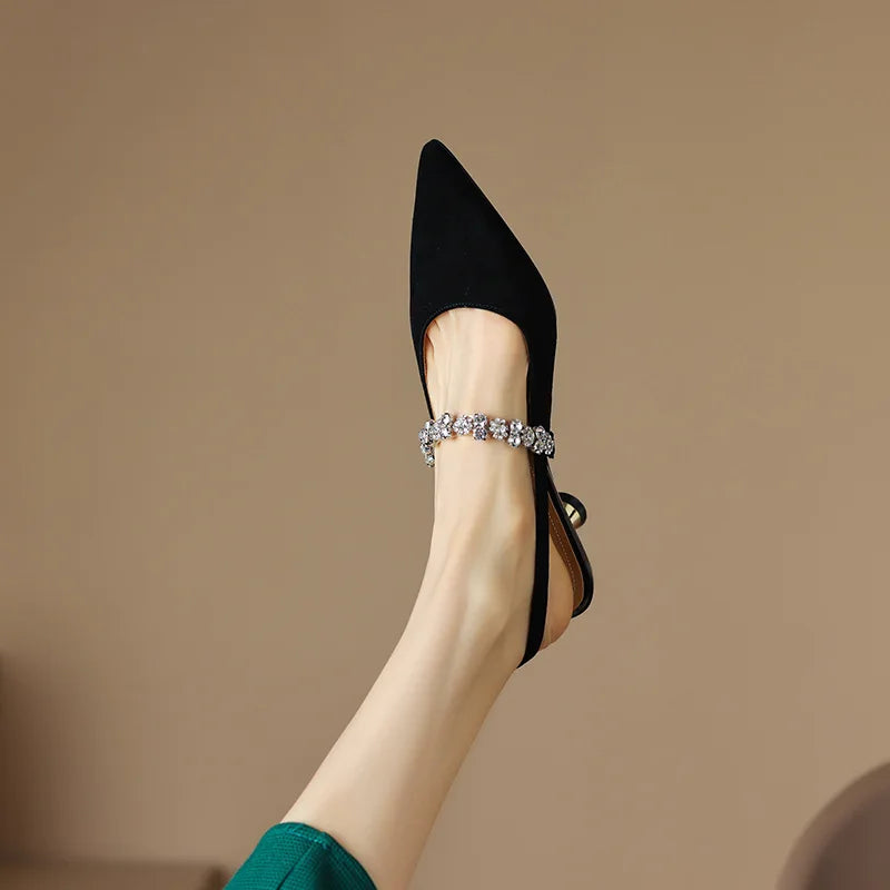 Comfortable women's crystal strap pointed toe slingback heels. Sparkling elegant style for dress wear.