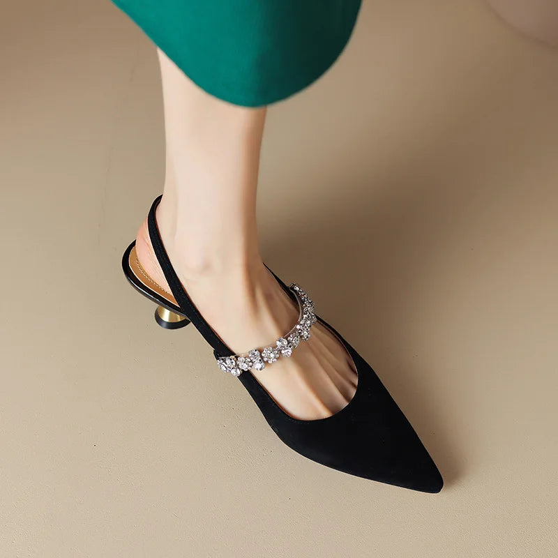 Glamorous silver crystal strap slingback heels. Pointed toe evening shoes for women's special occasions.