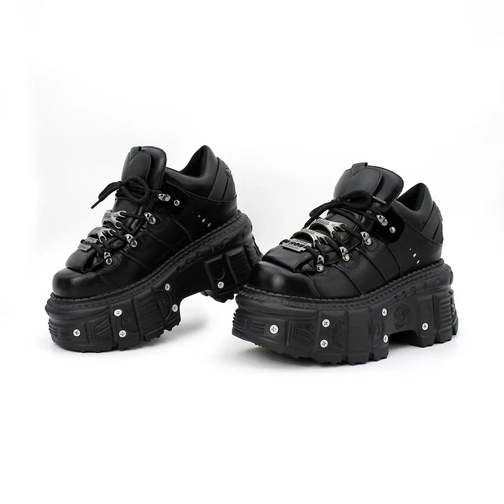 Durable black leather-look women's punk platform boots featuring a prominent lace-up and thick sole.